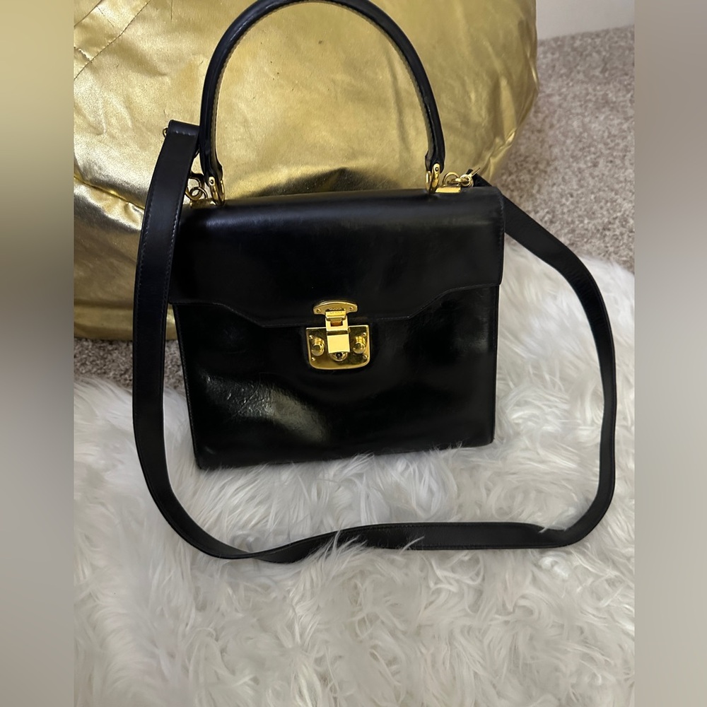 Gucci Vintage 1980's RARE black Leather 3-way bag, stunning red leather interior